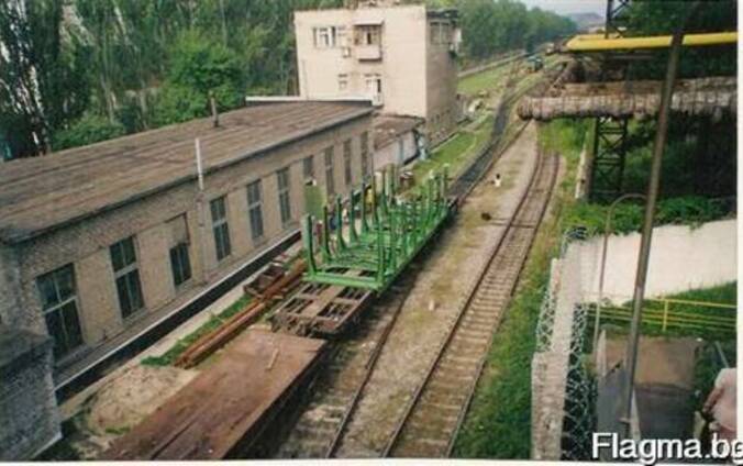 Контейнеры для перевозки леса на фитинговых платформах